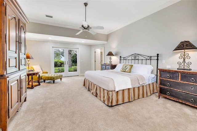 carpeted bedroom with french doors, ceiling fan, and ornamental molding