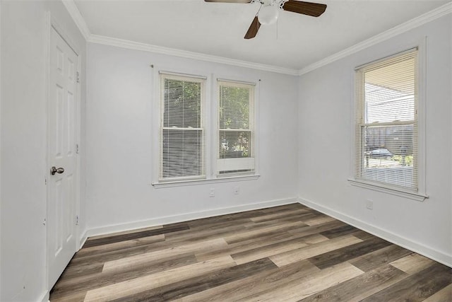 4180 Whitlock St, Brunswick, GA 31520 - spare room with plenty of natural light, crown molding, dark wood-type flooring, and a ceiling fan