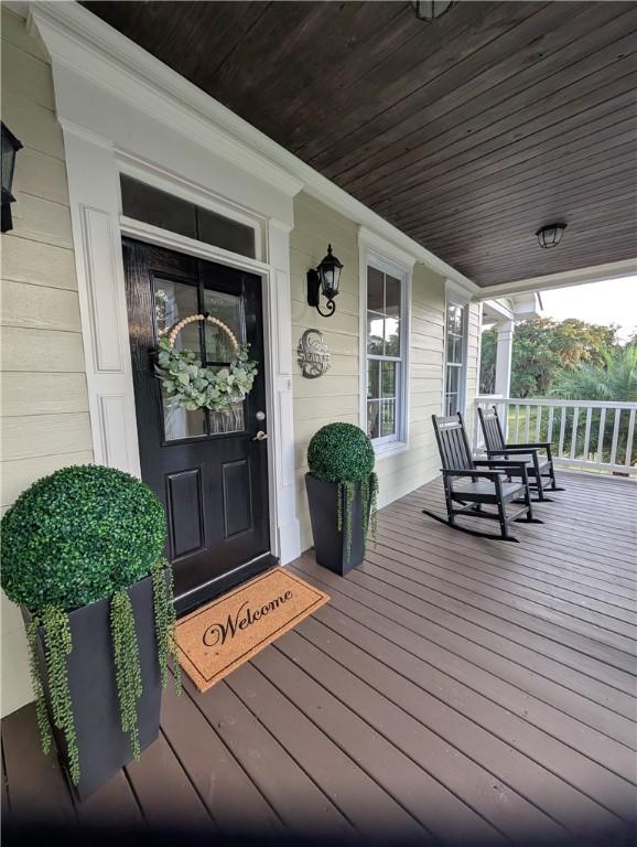 2115 Marshview Dr, Shellman Bluff, GA 31331 - view of wooden porch
