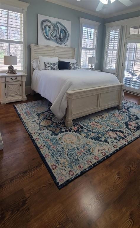 2115 Marshview Dr, Shellman Bluff, GA 31331 - bedroom featuring crown molding, access to exterior, dark wood finished floors, and a ceiling fan