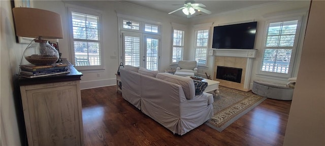 2115 Marshview Dr, Shellman Bluff, GA 31331 - living room with healthy amount of natural light, crown molding, a fireplace, a ceiling fan, and dark wood-style floors
