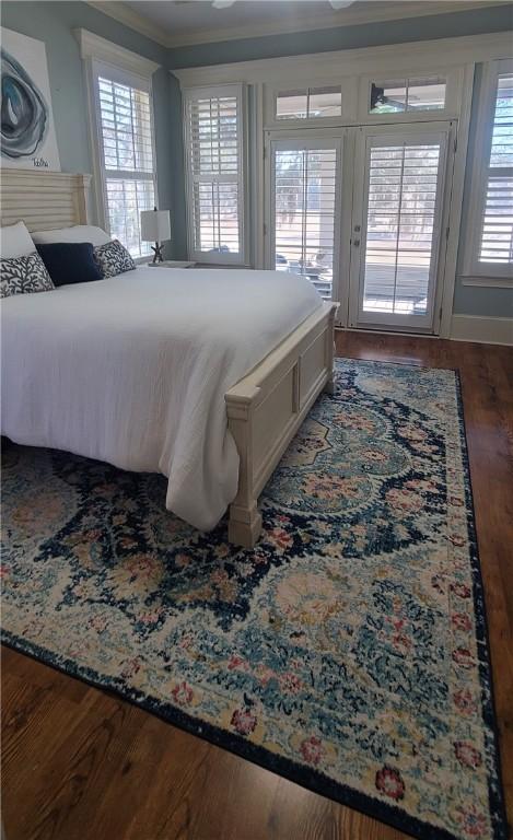 2115 Marshview Dr, Shellman Bluff, GA 31331 - bedroom featuring access to outside, wood finished floors, and ornamental molding