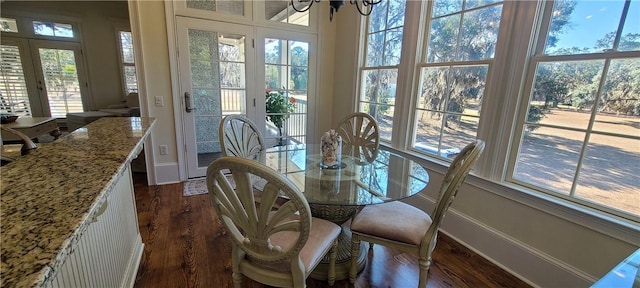 2115 Marshview Dr, Shellman Bluff, GA 31331 - dining space featuring dark wood-style floors, plenty of natural light, and french doors