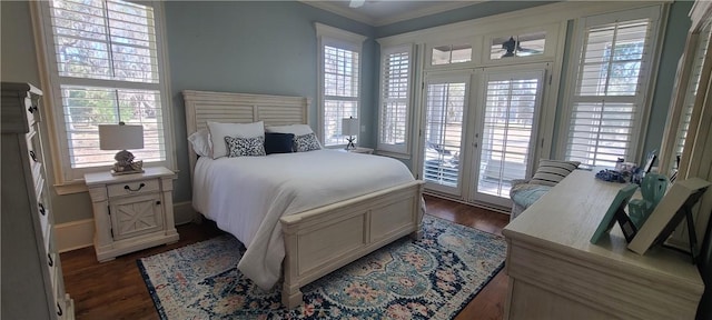 2115 Marshview Dr, Shellman Bluff, GA 31331 - bedroom with access to outside, multiple windows, and dark wood-type flooring