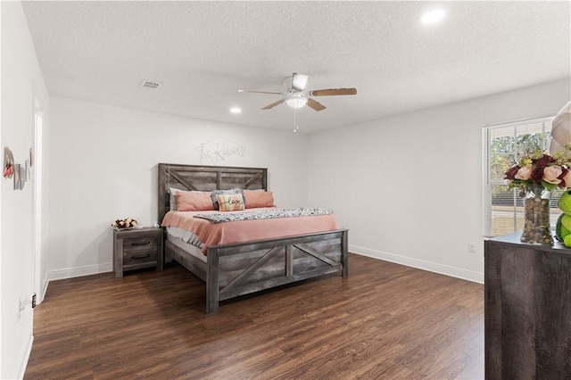 825 Red Hawk Dr, Waynesville, GA 31566 - bedroom with wood finished floors, baseboards, recessed lighting, a ceiling fan, and a textured ceiling