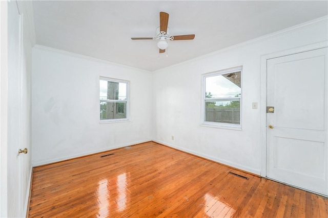 101 Forrest Ave, Waycross, GA 31501 - spare room with hardwood / wood-style flooring, crown molding, healthy amount of natural light, and a ceiling fan