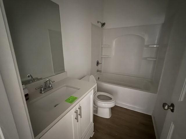 70 Harmonees Way, Ludowici, GA 31316 - bathroom with vanity, wood finished floors, and shower / tub combination