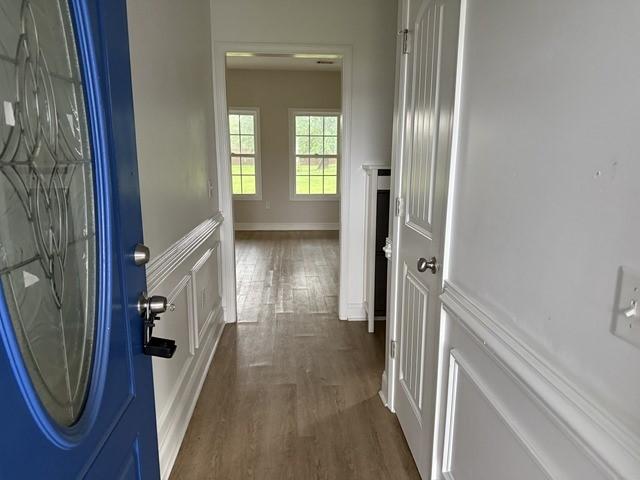 70 Harmonees Way, Ludowici, GA 31316 - corridor featuring dark wood finished floors