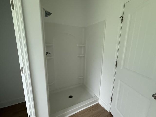 70 Harmonees Way, Ludowici, GA 31316 - full bath featuring a stall shower and wood finished floors