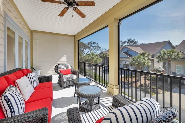 balcony featuring ceiling fan and outdoor lounge area