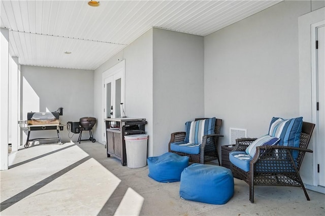 164 Sunrise Dr, Saint Simons Island, GA 31522 - view of patio featuring french doors and visible vents