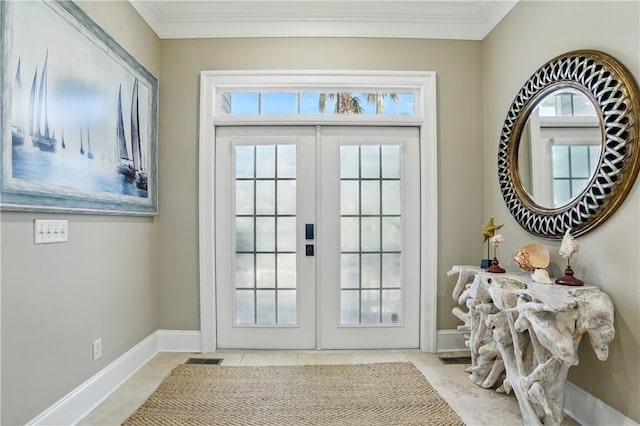 164 Sunrise Dr, Saint Simons Island, GA 31522 - doorway with baseboards, ornamental molding, french doors, and visible vents