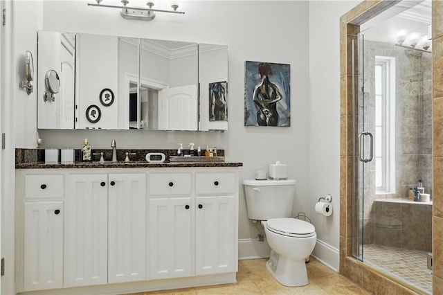 164 Sunrise Dr, Saint Simons Island, GA 31522 - full bath featuring a shower stall, tile patterned flooring, toilet, vanity, and baseboards