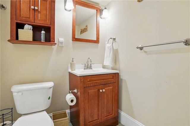 164 Sunrise Dr, Saint Simons Island, GA 31522 - half bathroom featuring toilet and vanity