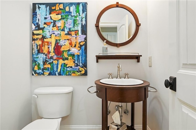 164 Sunrise Dr, Saint Simons Island, GA 31522 - bathroom with toilet and baseboards