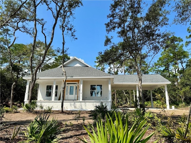 view of front facade with a carport