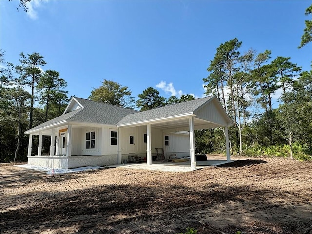 exterior space featuring a carport