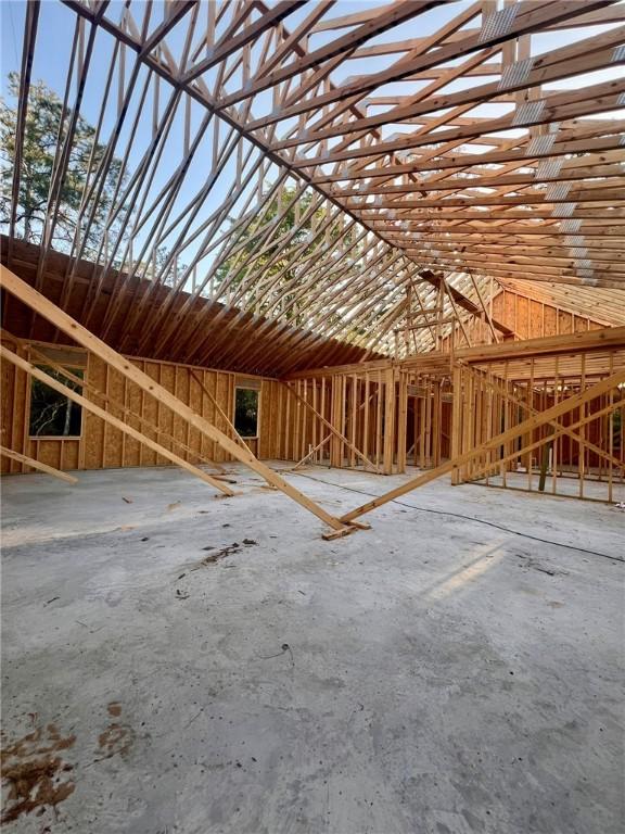 miscellaneous room with vaulted ceiling