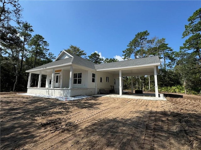 view of front of house featuring a carport