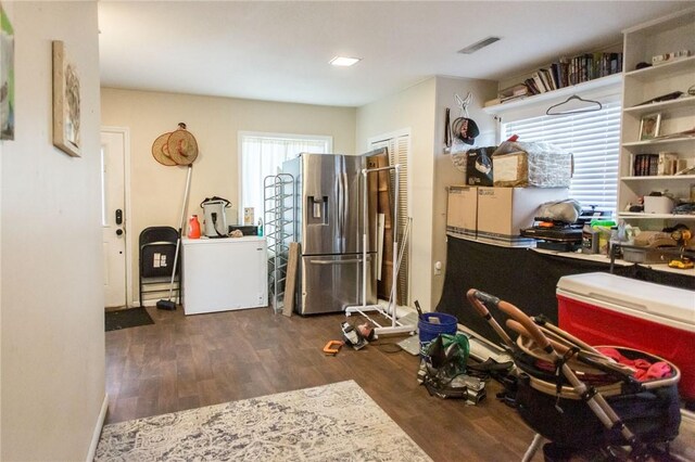 1002 Cherokee Cir, Waycross, GA 31501 - kitchen with stainless steel fridge and dark wood-style flooring