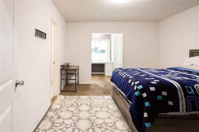 1002 Cherokee Cir, Waycross, GA 31501 - bedroom featuring carpet floors and baseboards