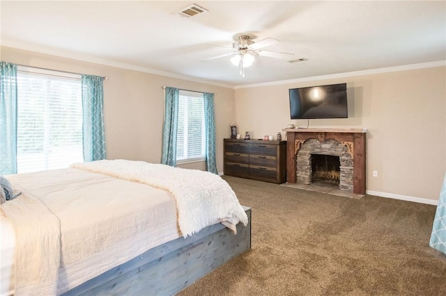 1002 Cherokee Cir, Waycross, GA 31501 - bedroom with ornamental molding, carpet flooring, a fireplace, a ceiling fan, and baseboards