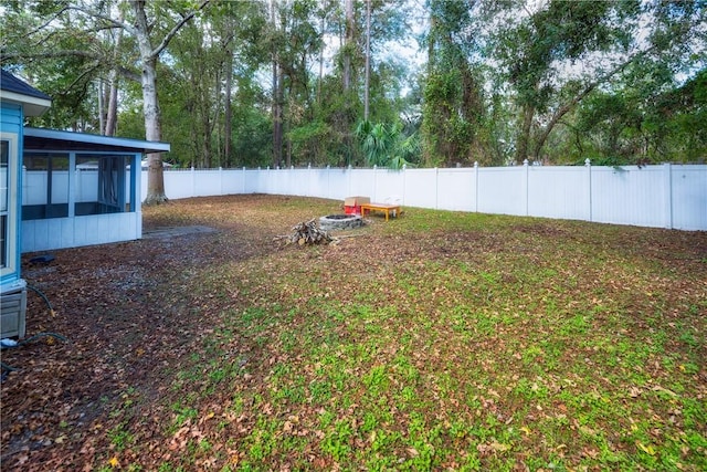 view of yard featuring a sunroom