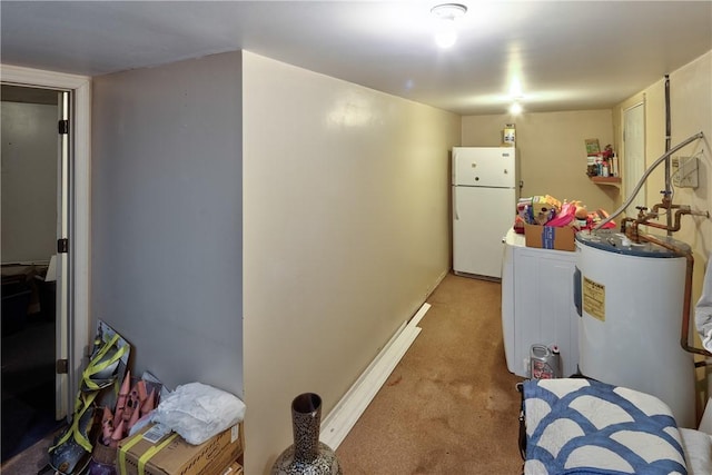 washroom with electric water heater and carpet floors