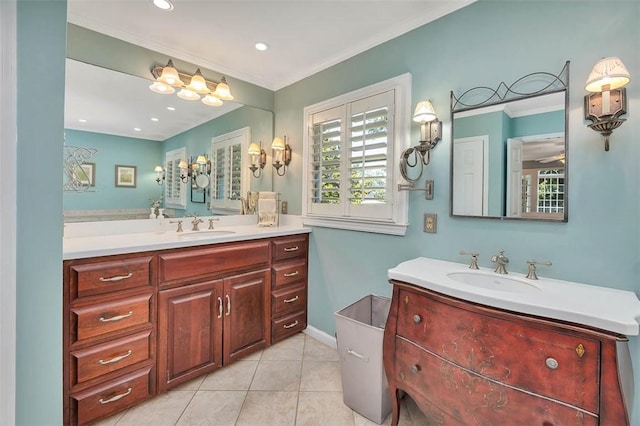 213 Five Pounds Rd, Saint Simons Island, GA 31522 - bathroom featuring two vanities, crown molding, tile patterned floors, recessed lighting, and baseboards