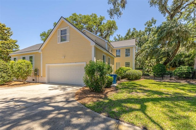 213 Five Pounds Rd, Saint Simons Island, GA 31522 - view of front of home with an attached garage and driveway