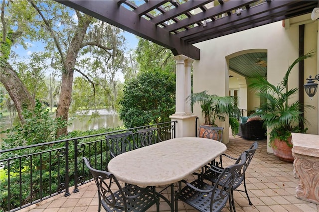 view of patio with outdoor dining area and a pergola