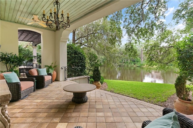 view of patio featuring a water view