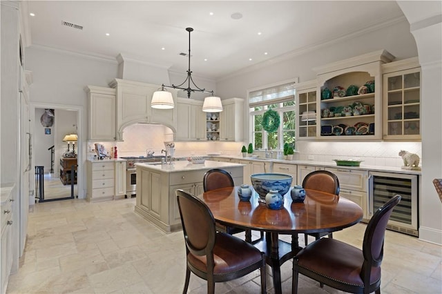 kitchen with visible vents, wine cooler, high end stainless steel range, light countertops, and open shelves