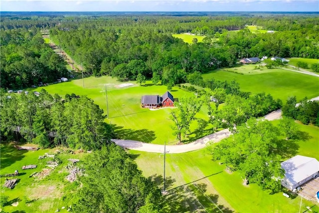 bird's eye view featuring a view of trees