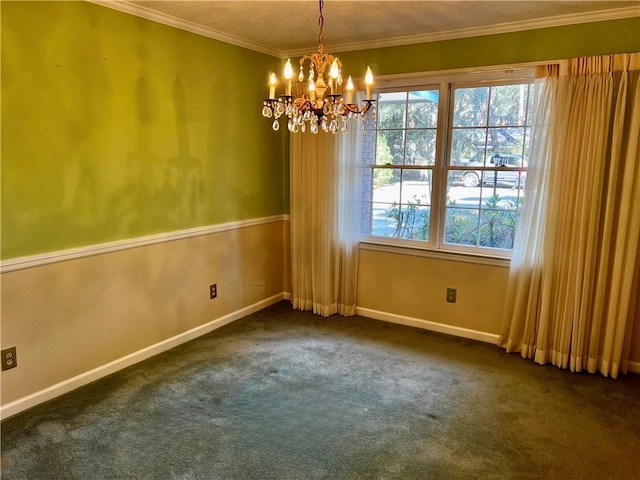 carpeted empty room featuring a chandelier, a textured ceiling, and ornamental molding