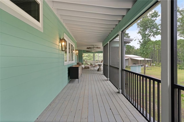 wooden terrace featuring covered porch