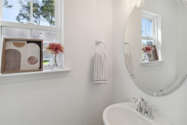 bathroom with plenty of natural light and sink