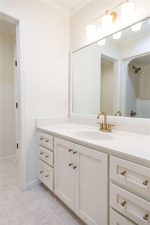 bathroom featuring vanity and ornamental molding