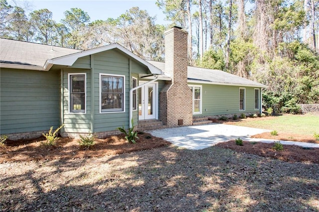 rear view of property with a patio