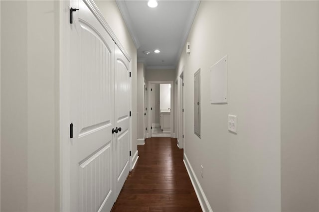 105 Gascoigne Ave Unit 204, Saint Simons Island, GA 31522 - hallway with crown molding, recessed lighting, and dark wood-type flooring