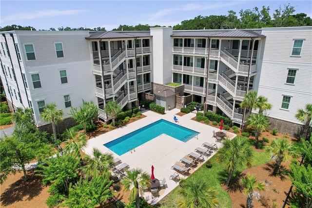 105 Gascoigne Ave Unit 204, Saint Simons Island, GA 31522 - community pool featuring a patio area