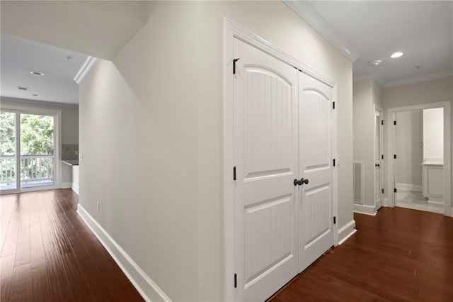 105 Gascoigne Ave Unit 204, Saint Simons Island, GA 31522 - hall featuring crown molding, wood finished floors, and recessed lighting