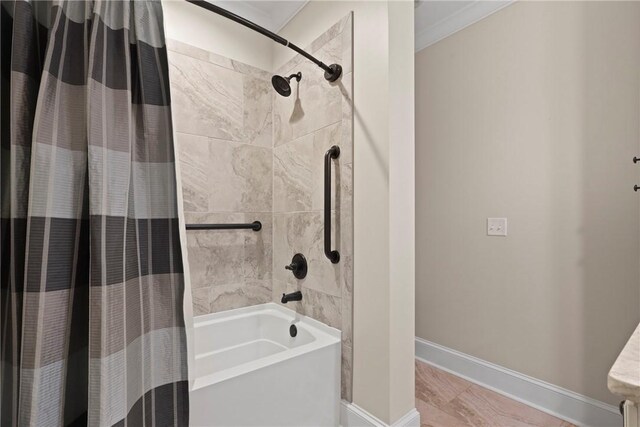 105 Gascoigne Ave Unit 204, Saint Simons Island, GA 31522 - full bath with shower / bath combo with shower curtain, ornamental molding, and marble finish flooring