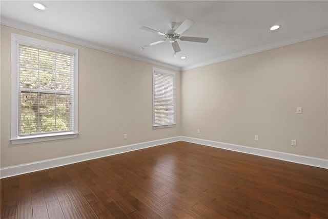 105 Gascoigne Ave Unit 204, Saint Simons Island, GA 31522 - empty room with plenty of natural light, ornamental molding, dark wood-style flooring, a ceiling fan, and recessed lighting