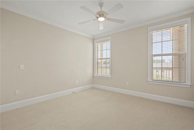 105 Gascoigne Ave Unit 204, Saint Simons Island, GA 31522 - unfurnished room with light colored carpet, plenty of natural light, crown molding, and ceiling fan