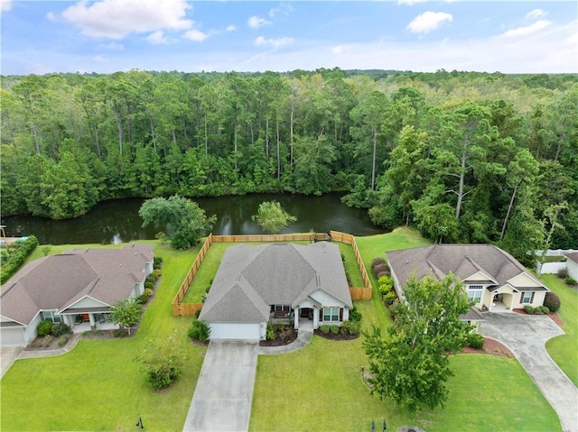 birds eye view of property featuring a water view