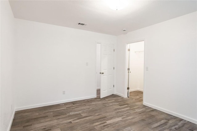 201 Washington Ave, Waycross, GA 31503 - empty room featuring wood finished floors and baseboards