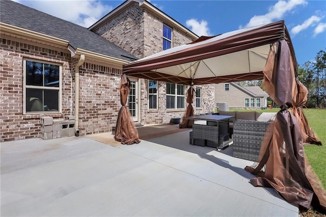 62 Wellington Cir, Brunswick, GA 31525 - view of patio / terrace with an outdoor living space