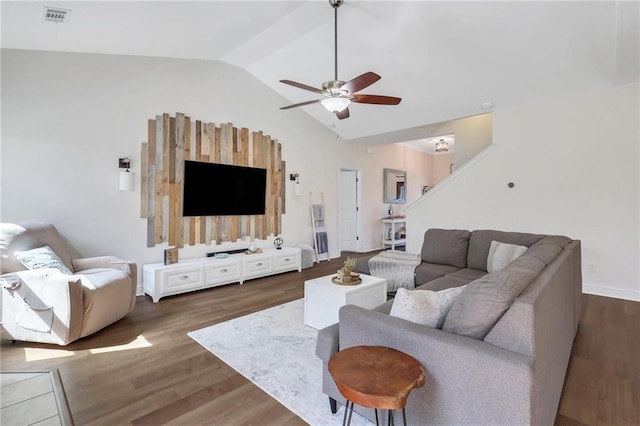62 Wellington Cir, Brunswick, GA 31525 - living area with vaulted ceiling, wood finished floors, a ceiling fan, and baseboards