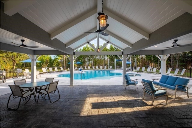 62 Wellington Cir, Brunswick, GA 31525 - community pool with a ceiling fan, a patio area, and a gazebo